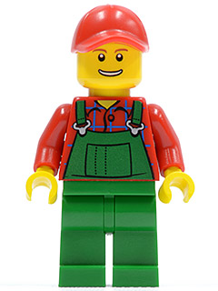 Salopette verte de fermier, casquette rouge trouée, sourire éclatant | hol028